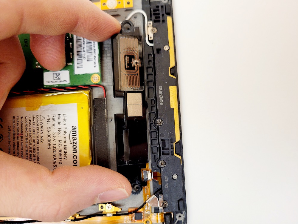 Kindle Voyage Battery Replacement Guide, taking the magnetic component out